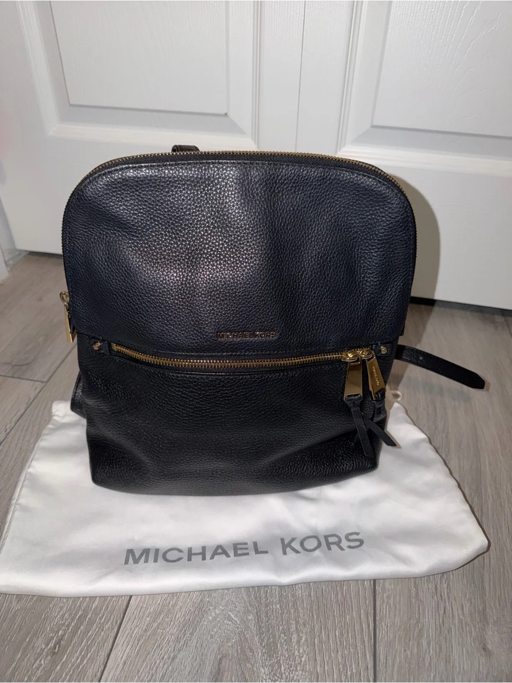 Michael Kors Black Pebbled Leather Backpack with Gold Accents